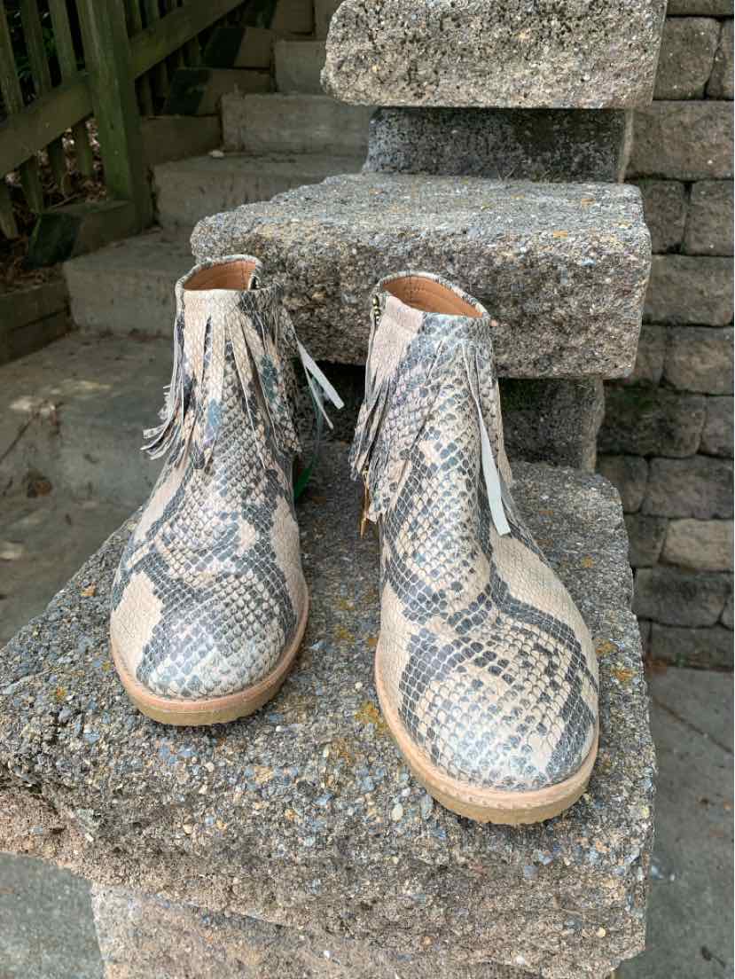 Tan and gray snake print ankle boots with round toes and side zippers, size 9.5.