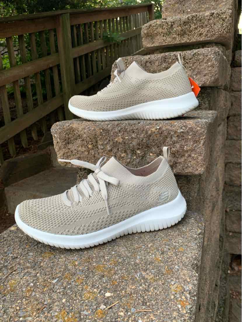 Taupe knit fabric sneakers with white soles and lace-up design, size 7.5 women's style.