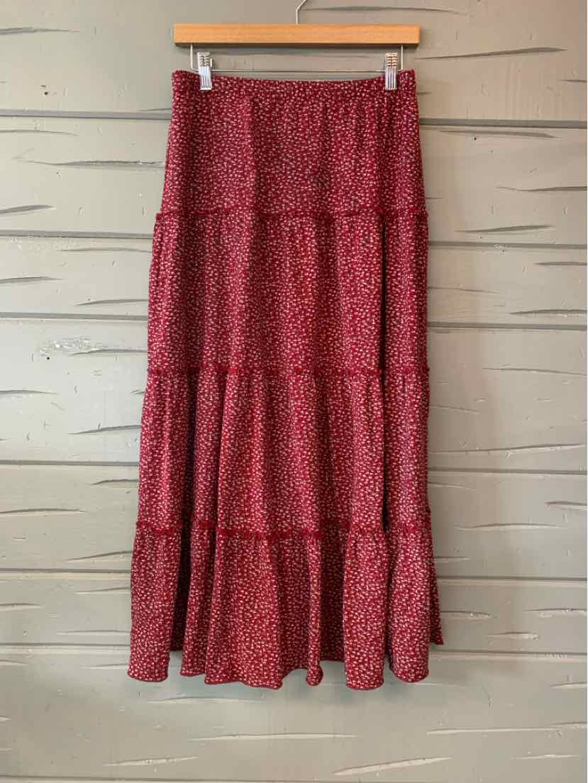 Red floral tiered midi skirt with a gathered, flowy silhouette and elastic waistband.