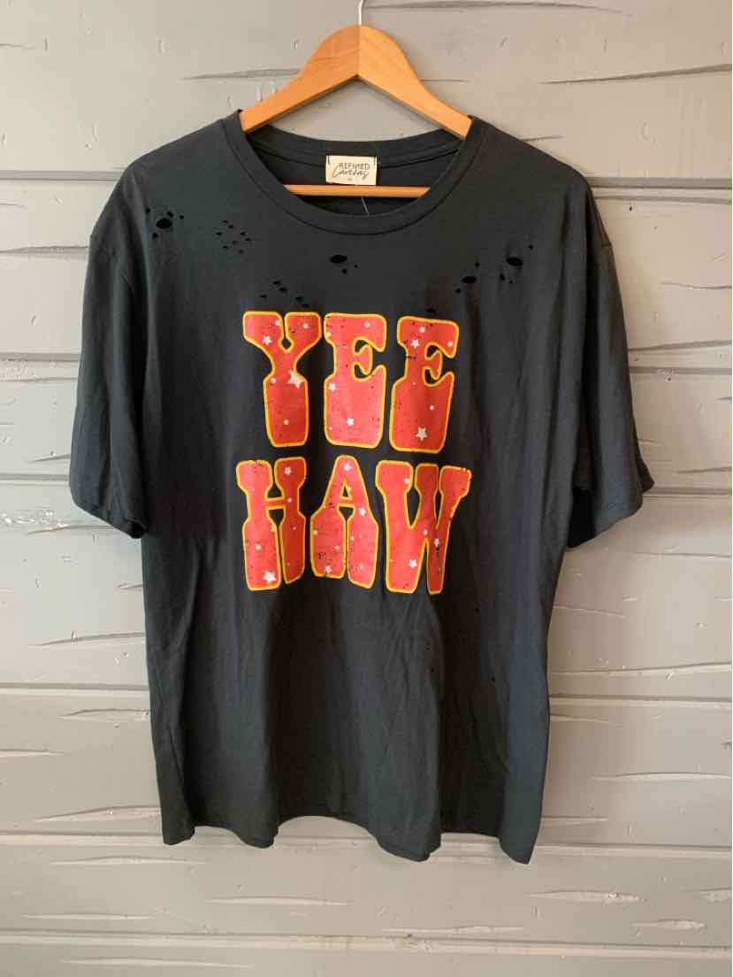 Black cotton t-shirt with distressed details and large bold "YEE HAW" text in red and yellow on front.
