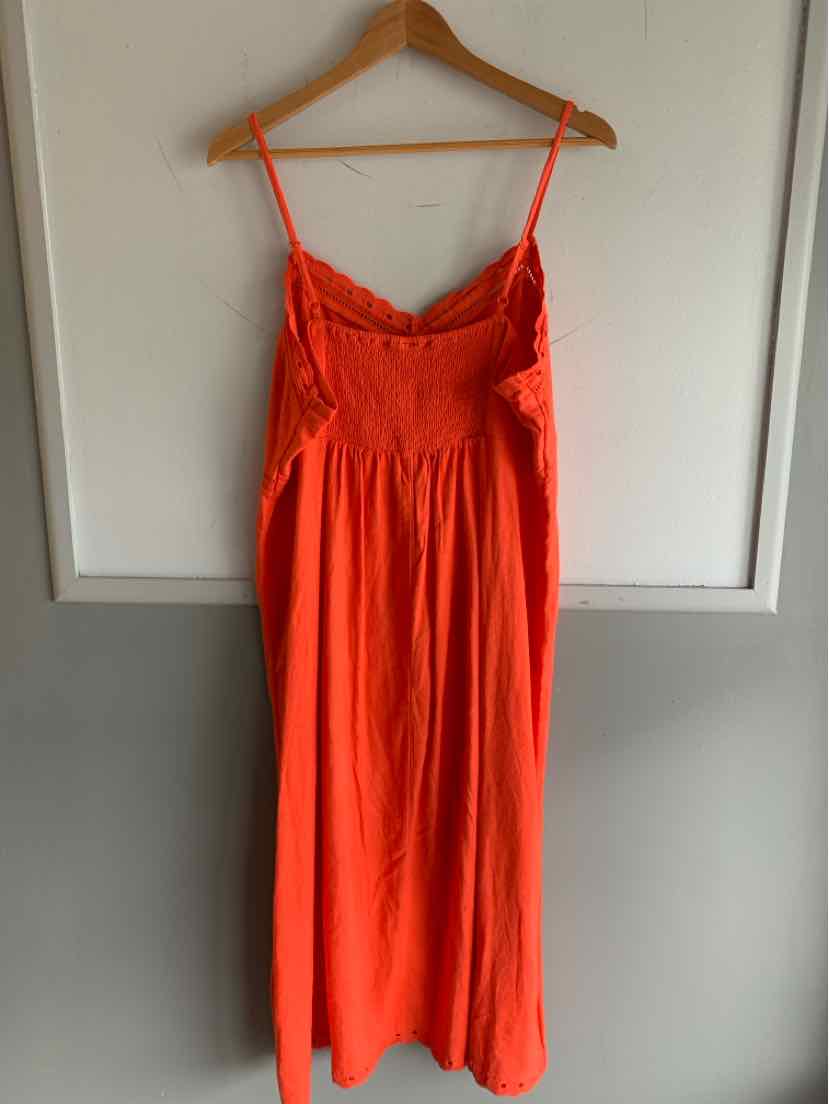 Bright orange sleeveless maxi dress with spaghetti straps and gathered waist detail.
