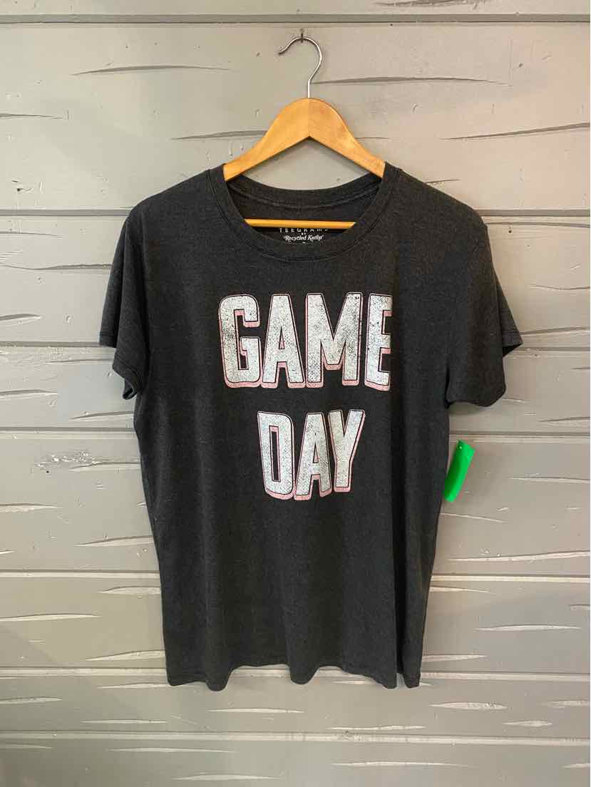 Charcoal gray short-sleeve t-shirt with white and orange "GAME DAY" text on front.