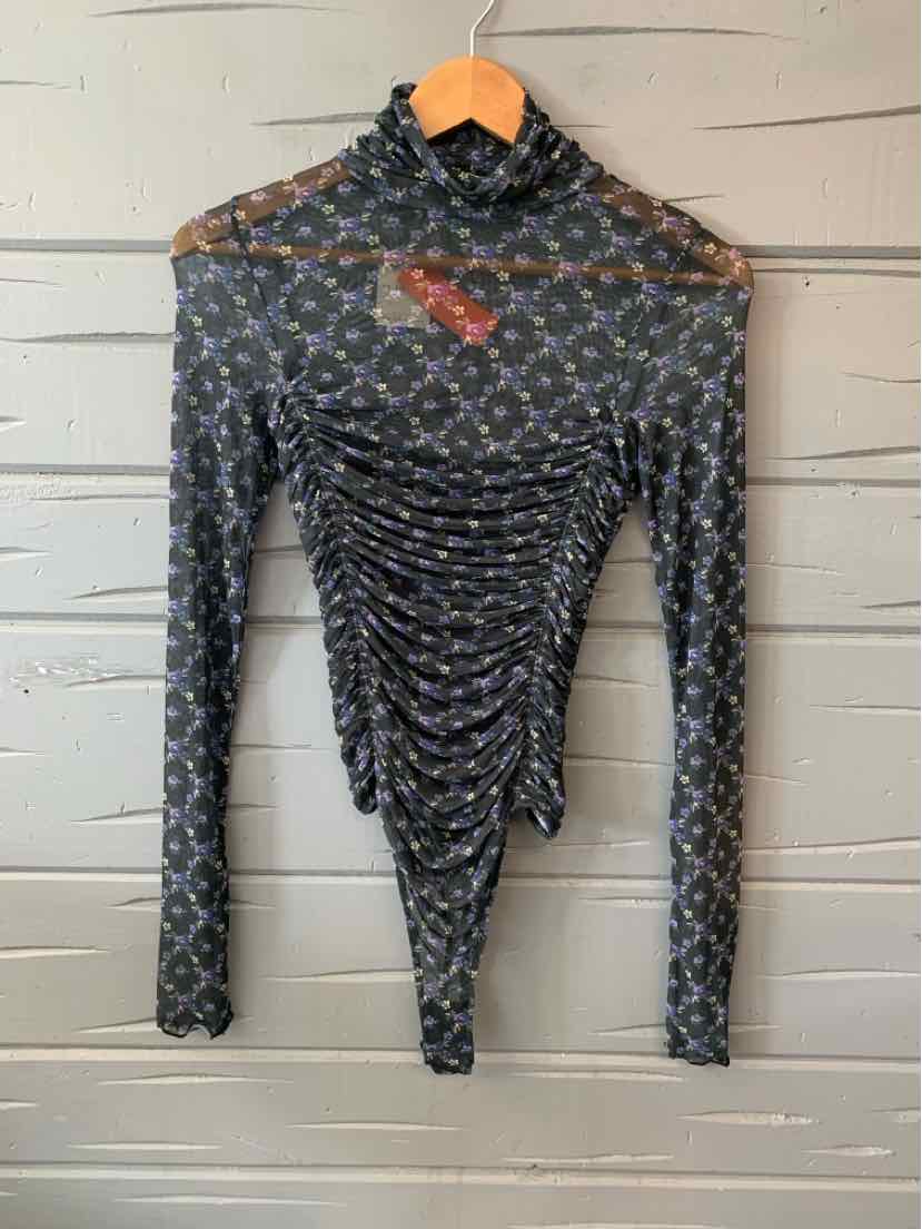 Black sheer long-sleeve bodysuit with small white floral print, high neck, and ruched front detail.