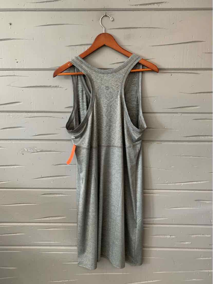 Light gray sleeveless racerback dress with soft, draping fabric hanging on wooden hanger.