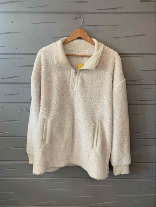 Cream-colored sherpa pullover with quarter zip and side pockets in XXL size.
