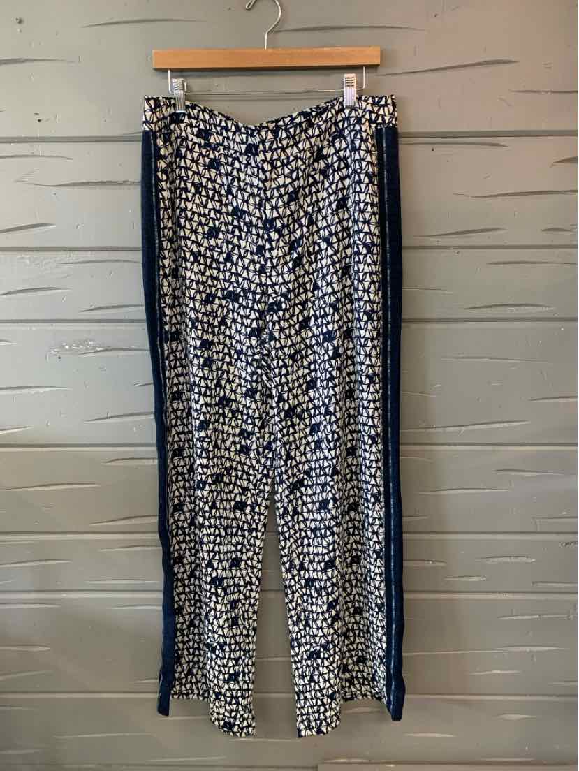 Blue and white patterned women's straight-leg pants with navy side stripes and an elastic waistband.