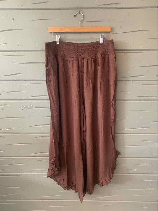 Brown wide-leg pants with elastic waistband and gathered hem, size 18-20.