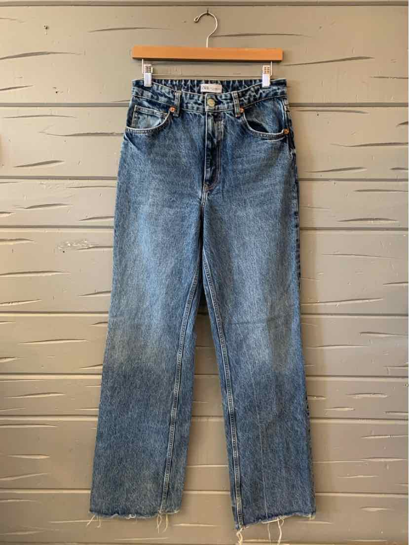 Blue Zara straight-leg jeans with a faded wash, belt loops, and a button fly.