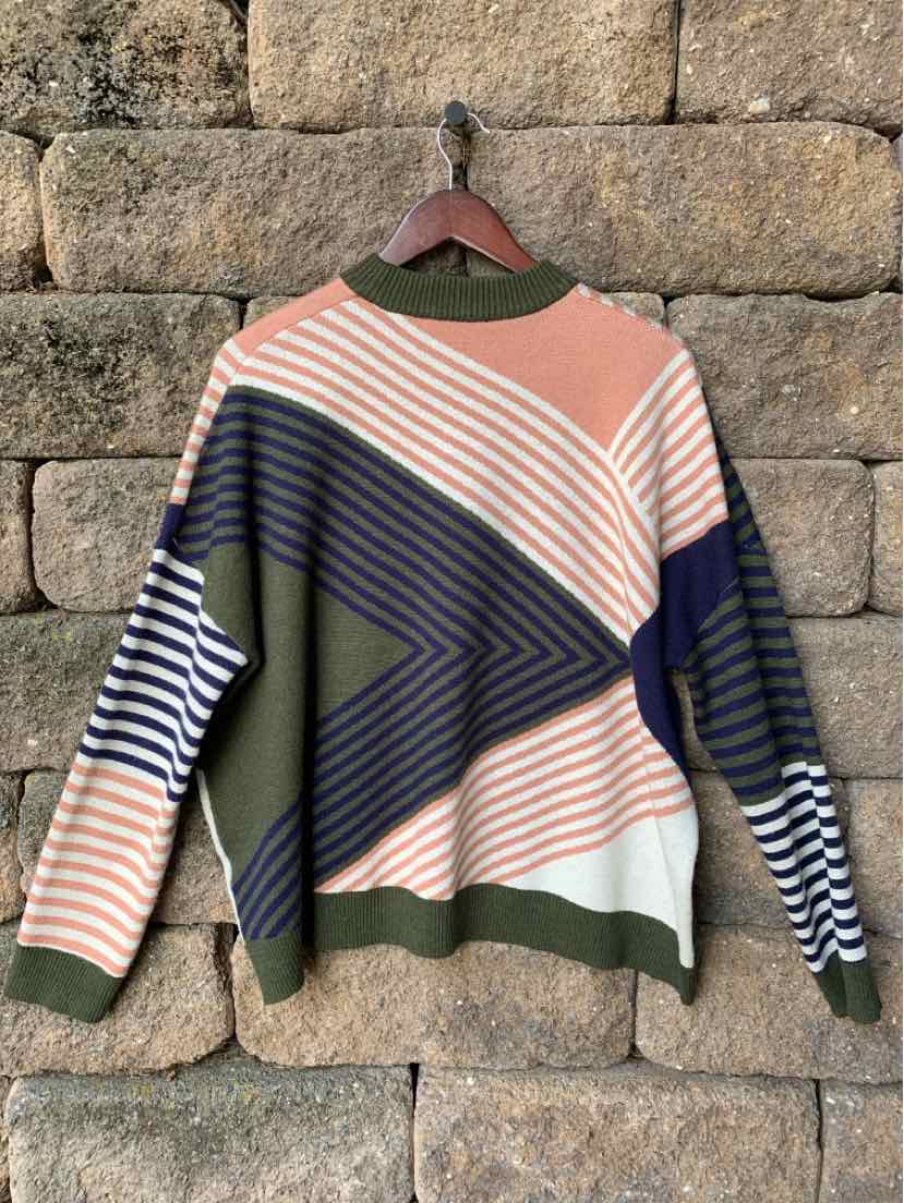 Long-sleeve knit sweater with geometric patterns in olive green, navy blue, peach, and white.