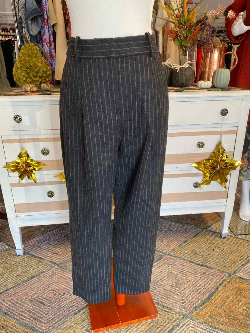 Gray pinstripe high-waist tailored pants with wide belt loops and straight legs, size 8.