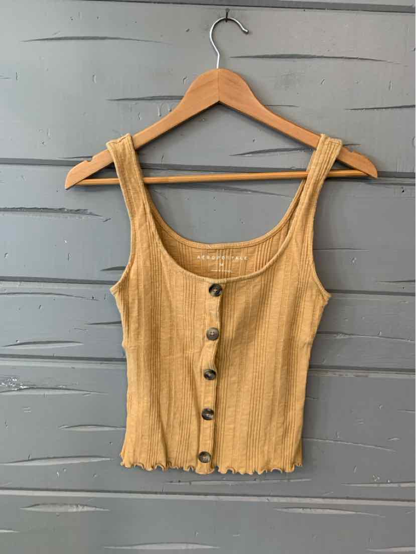 Mustard yellow ribbed tank top with wide straps and front buttons on wooden hanger.