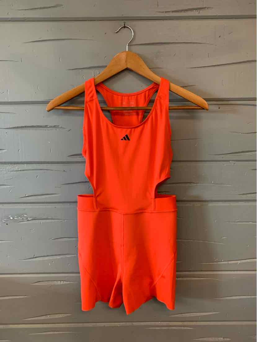 Bright orange sleeveless athletic romper with racerback design and Adidas logo on chest.