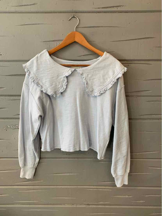 Light blue long-sleeve shirt with large scalloped lace collar and gathered cuffs, size small.