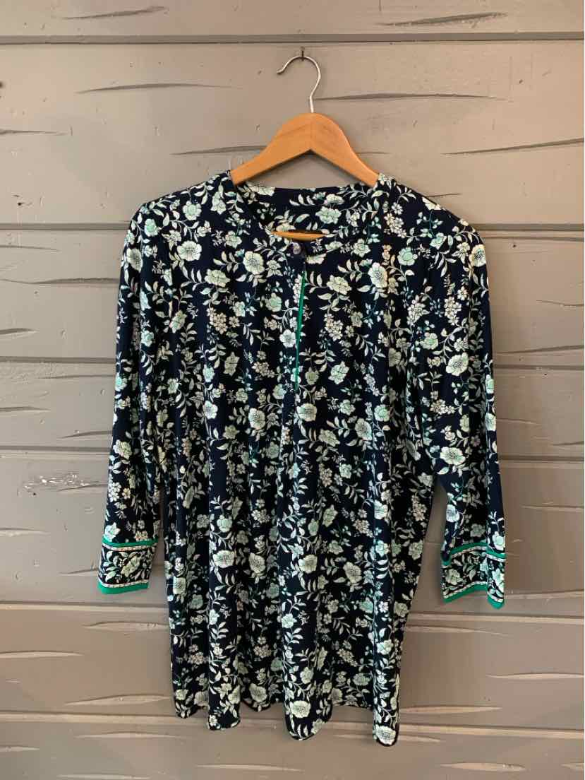 Black floral blouse with white and blue flowers, long sleeves, green trim on cuffs, medium size.