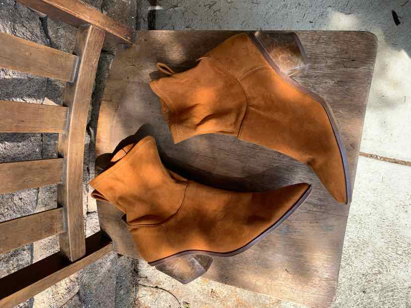 Tan suede ankle boots with pointed toes and block heels in size 8.5.