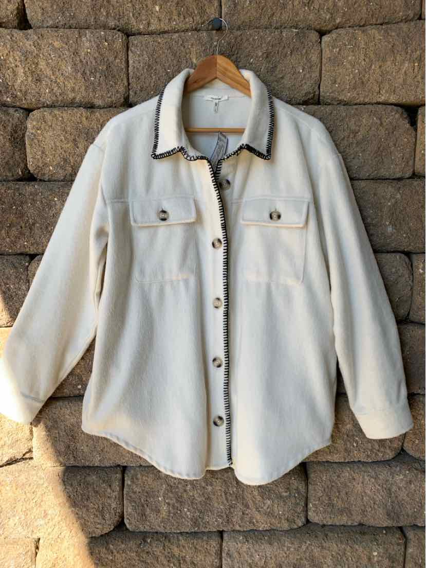 Women’s pale blue Maurices button-front shirt with pointed collar, chest pockets, and long sleeves.