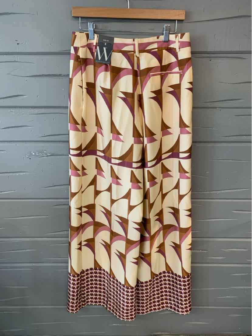 High-waisted wide-leg pants with abstract beige and burgundy geometric pattern and checkered hem.