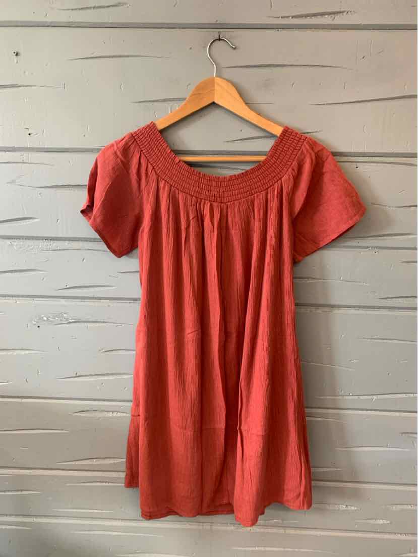 Rust brick-colored short-sleeve blouse with gathered neckline and loose fit, size small.