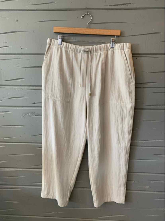 Light stone-colored wide-leg pants with an elastic waistband and drawstring in size XL.