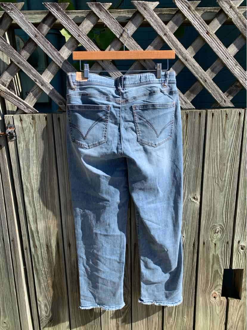 Light-wash blue denim jeans with a button closure, belt loops, back pockets, and straight legs.