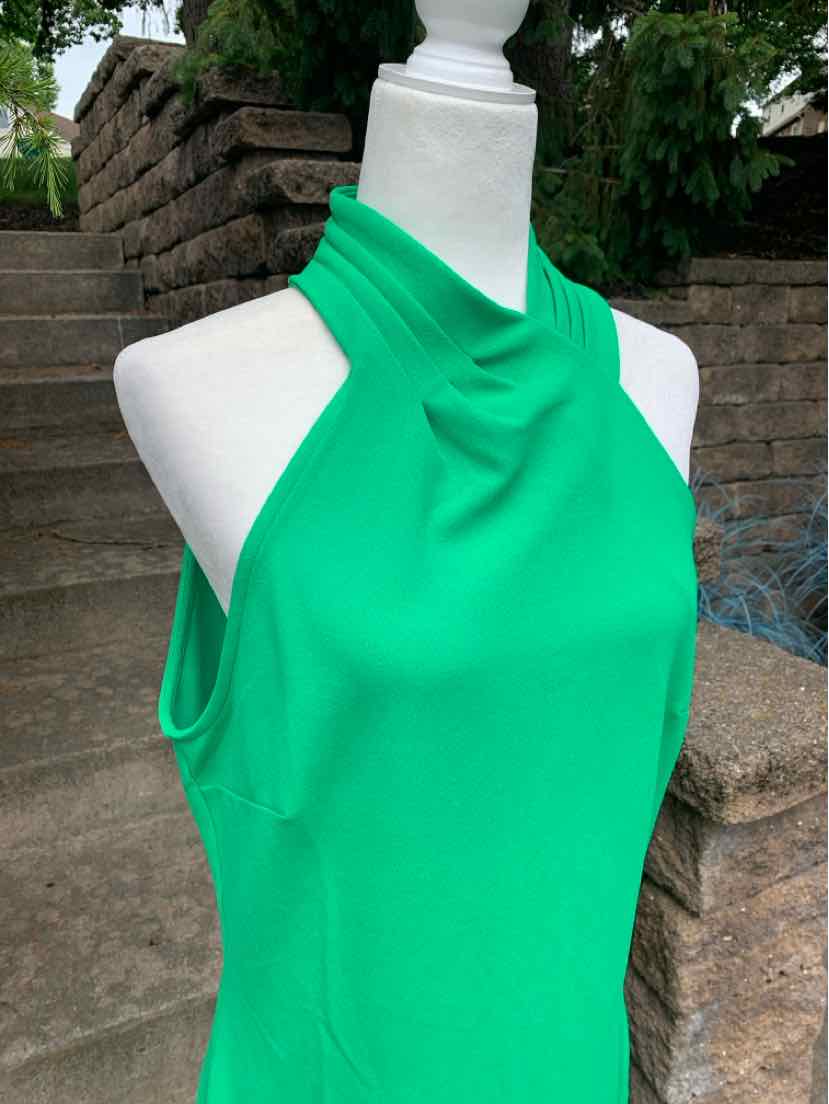 Bright green sleeveless halter top with draped neckline in size XL on white mannequin.