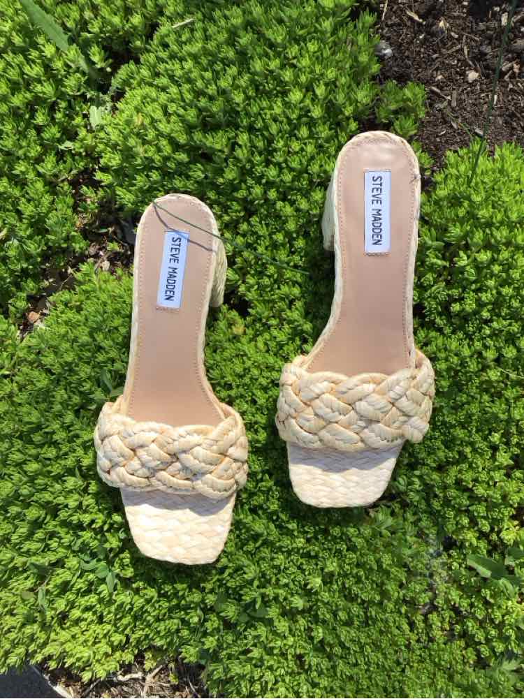 Beige woven straw slide sandals with square toes and Steve Madden logo insoles, size 9.