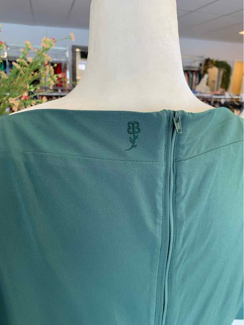 Greenish-gray smooth fabric jacket with a subtle logo stitched near the zipper on the back collar.
