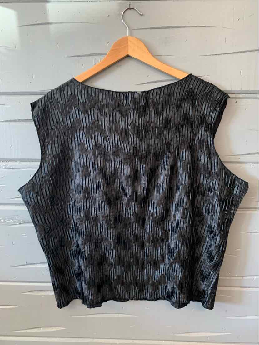 Black sleeveless top with subtle vertical stripe texture on wooden hanger.