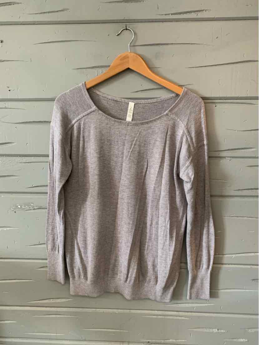 Light gray long-sleeve lightweight sweater with crew neck and subtle ribbed detailing.