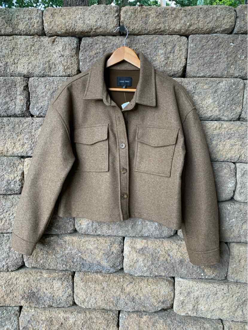 Brown wool blend cropped jacket with two front flap pockets and button closure.