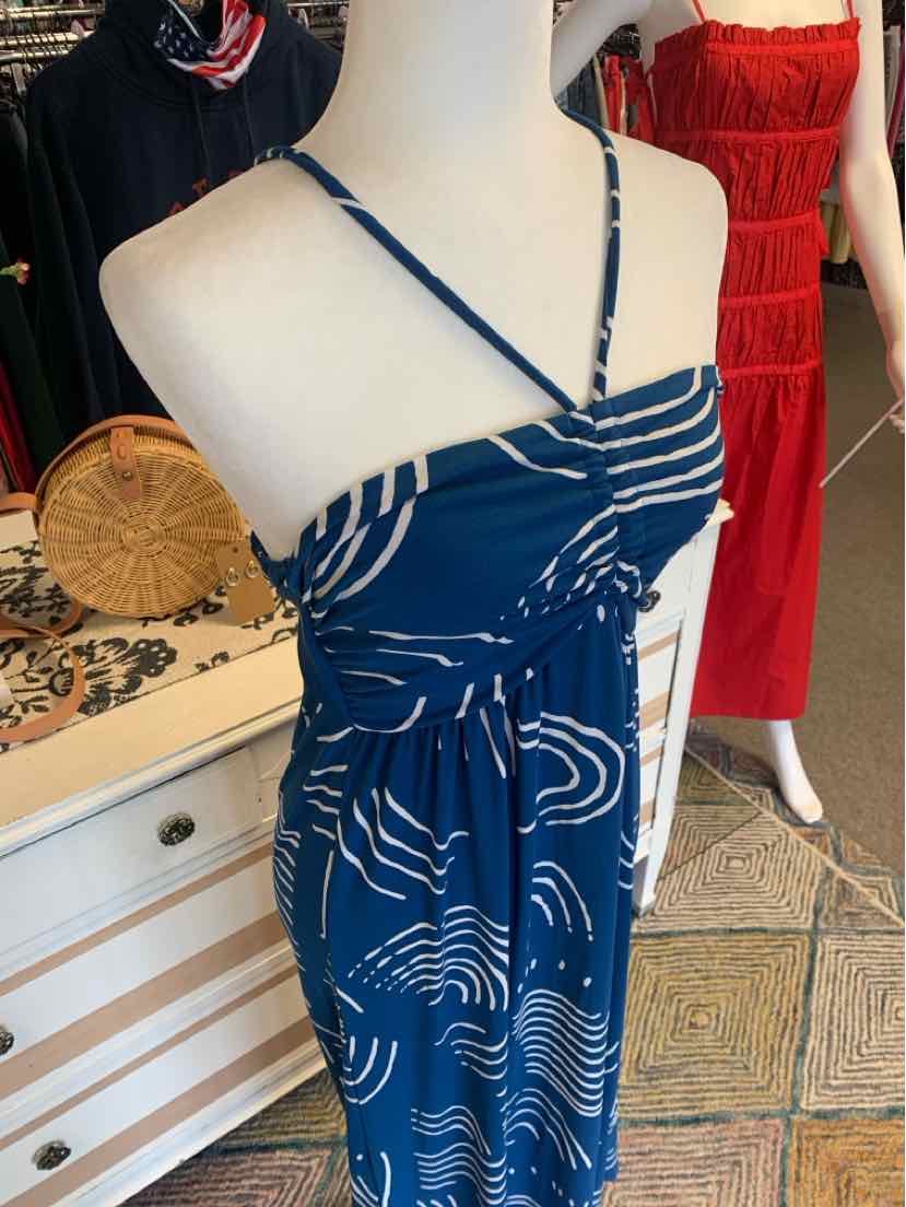 Navy blue dress with white abstract wave pattern, thin adjustable straps, and fitted waist in extra small size.