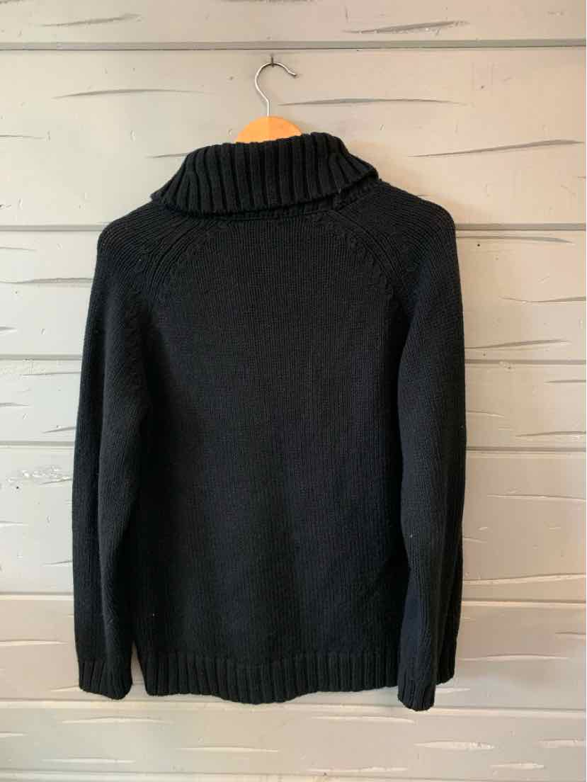 Black long-sleeve knit sweater with a thick ribbed turtleneck and ribbed cuffs and hem.