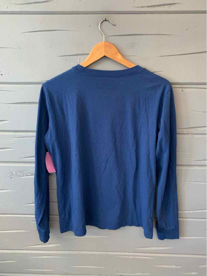 Navy blue long-sleeve cotton T-shirt with crew neck and relaxed fit hanging on wooden hanger.