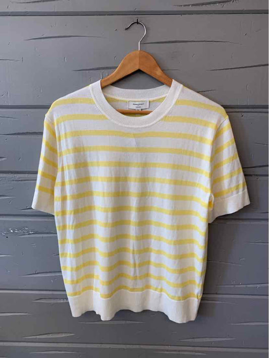 White short-sleeve T-shirt with thin yellow horizontal stripes and a crew neck.