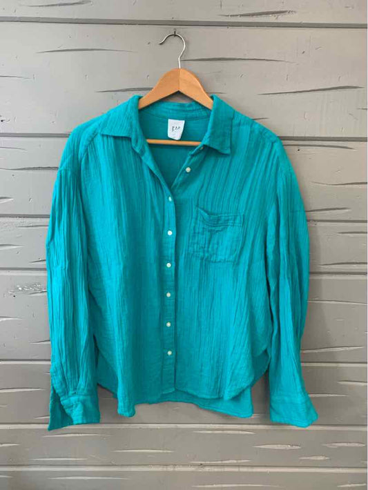 Teal button-up shirt with long sleeves and a chest pocket, lightweight fabric.