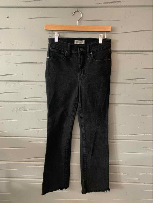 Black high-waisted denim jeans in size 2 with a straight leg and raw hem detailing.