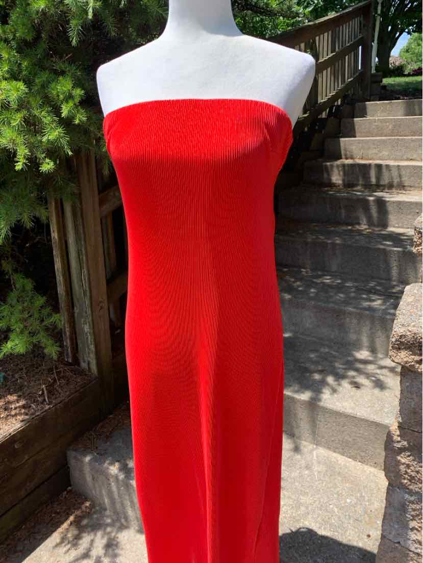 Strapless solid red midi dress with straight neckline and fitted silhouette.