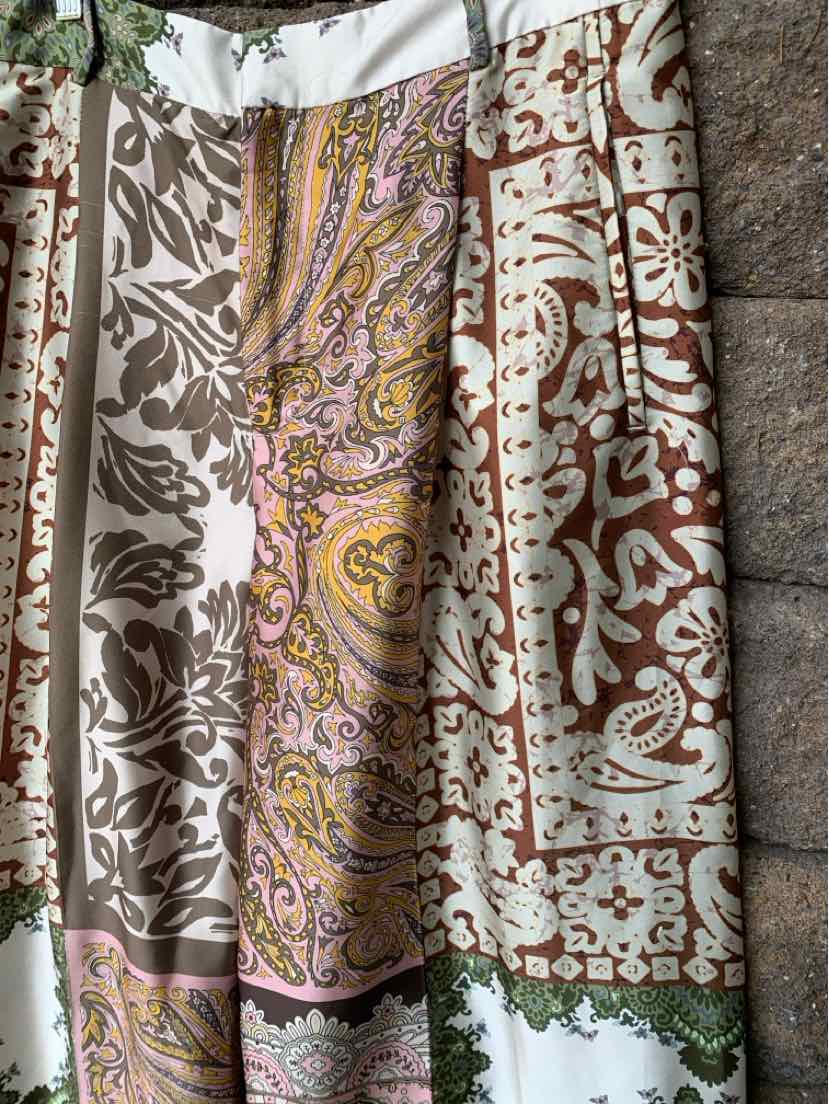 Patchwork skirt in beige, brown, olive, and soft pink with paisley and floral prints, elastic waistband.