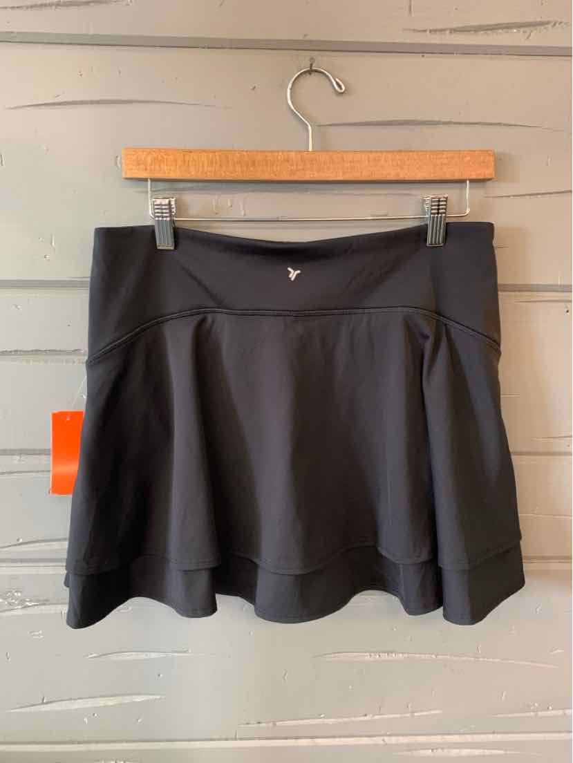 Black Old Navy athletic skirt with flared hem and wide waistband, size large.