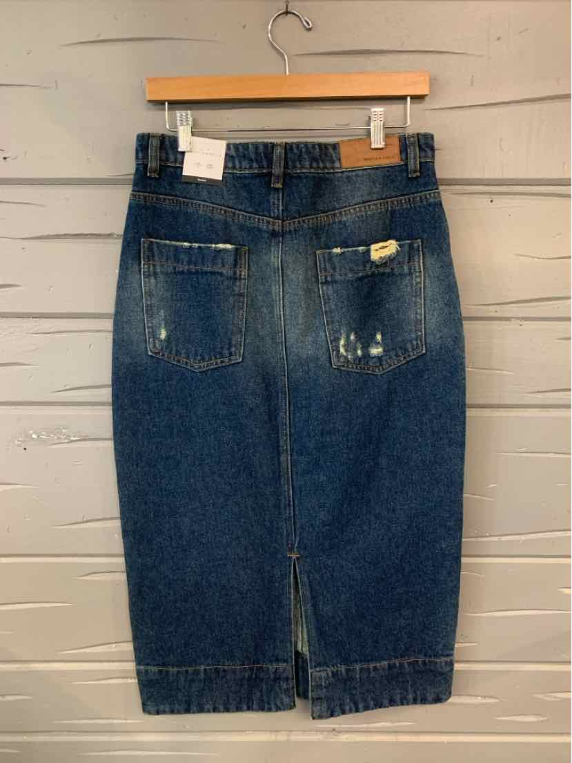 Dark blue denim midi skirt with back pockets, belt loops, and a center back slit.