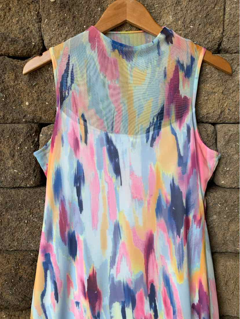 Sleeveless dress with multicolor abstract brushstroke pattern in pink, blue, yellow, and purple on lightweight fabric.