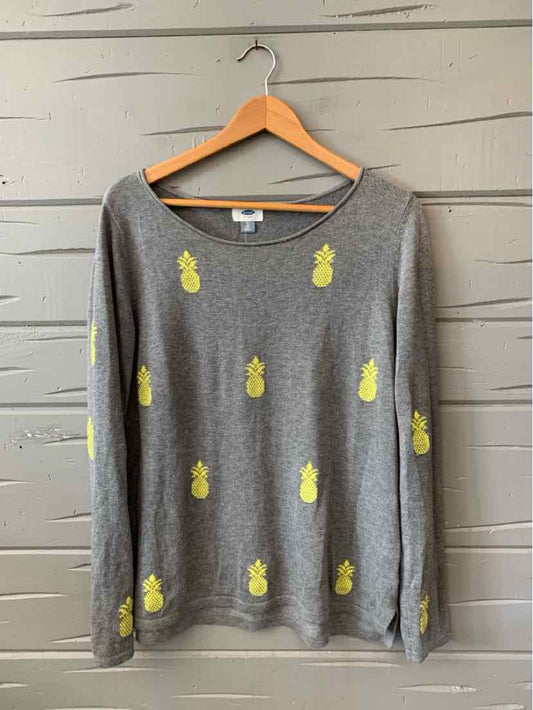 Gray long-sleeve knit sweater with yellow pineapple prints, crew neckline, size large.
