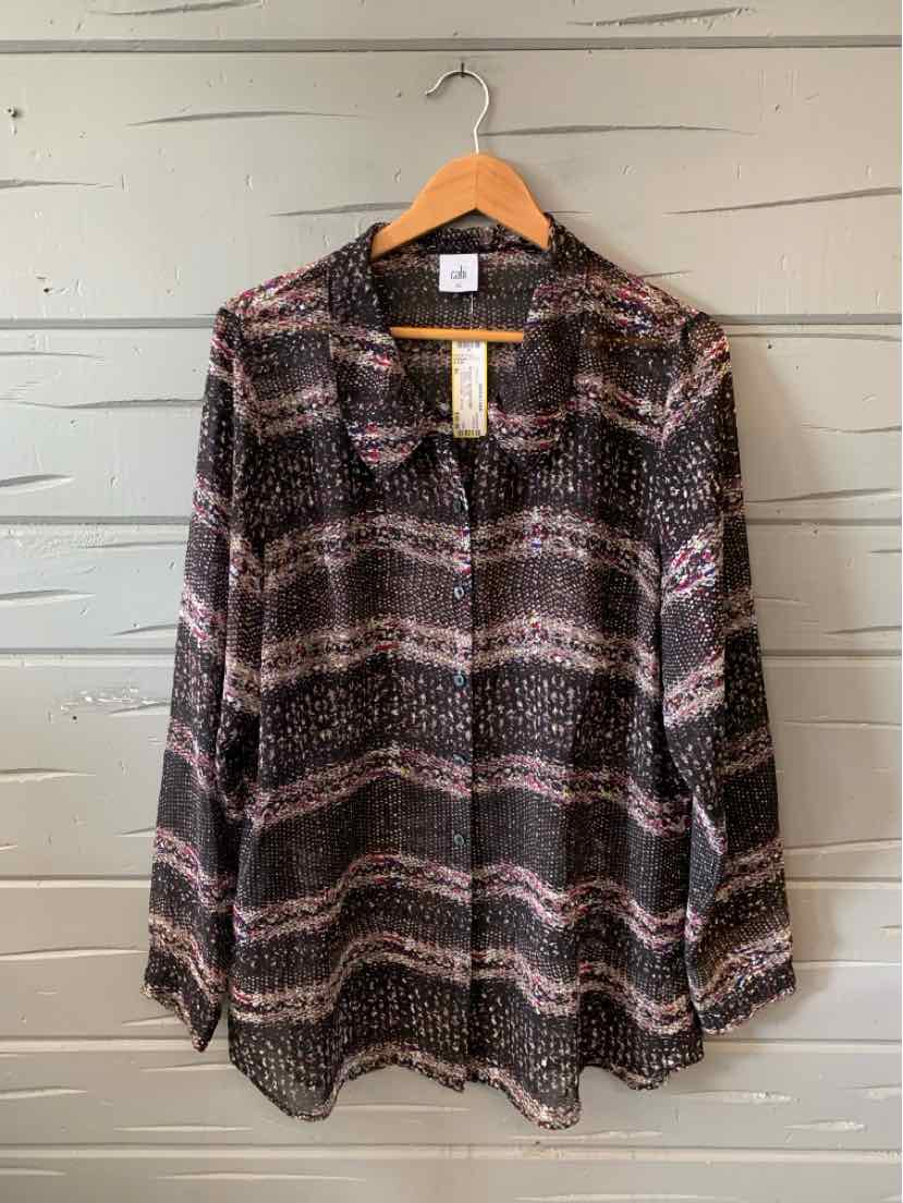 Black and gray patterned long-sleeve blouse with collar, button-up front, and relaxed fit, size XL.
