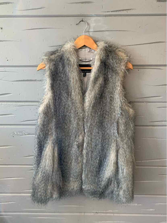 Gray sleeveless faux fur vest with a soft, fluffy texture and open front design.