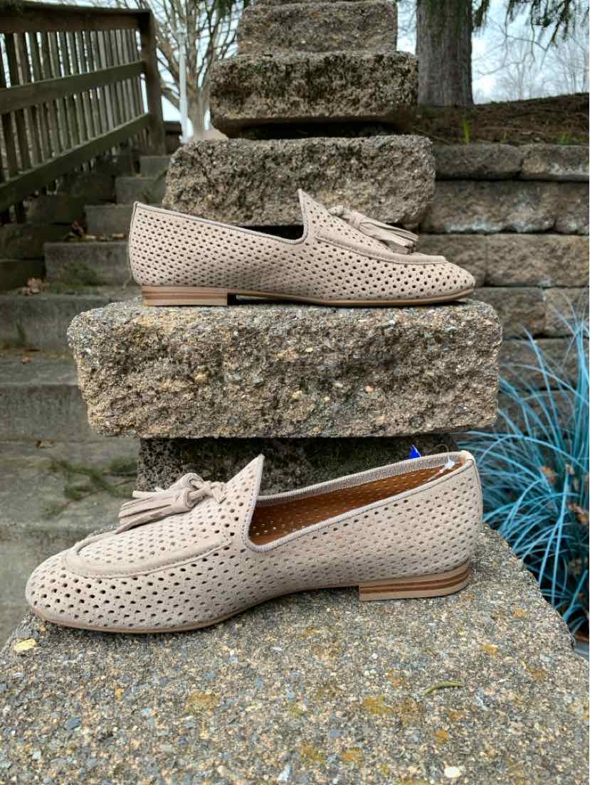 Beige woven leather slip-on loafers with low wooden heel and rounded toe, size 7.