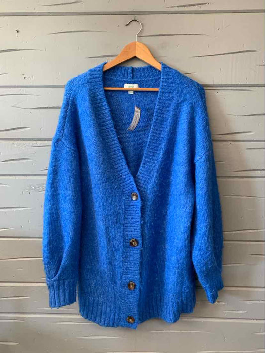 Bright blue fuzzy knit cardigan with a V-neck, front buttons, and ribbed cuffs and hem.