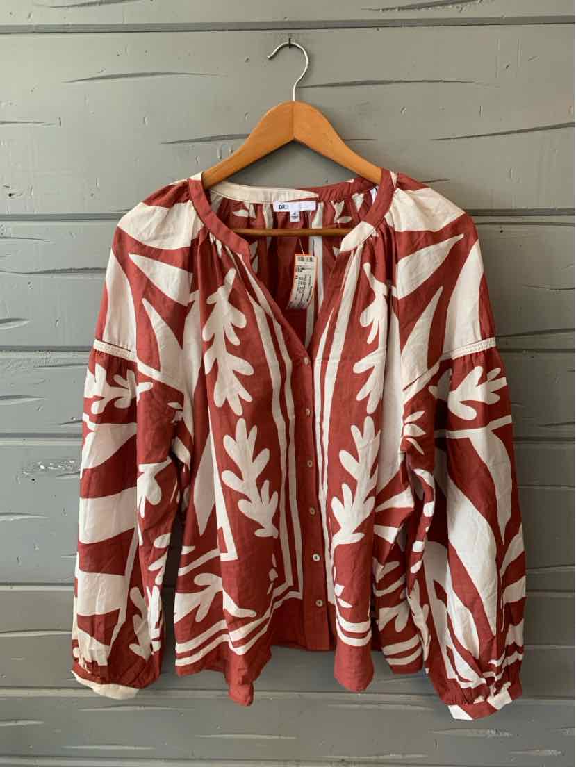 Red and white patterned lightweight jacket with full zipper and elastic cuffs in size XL.