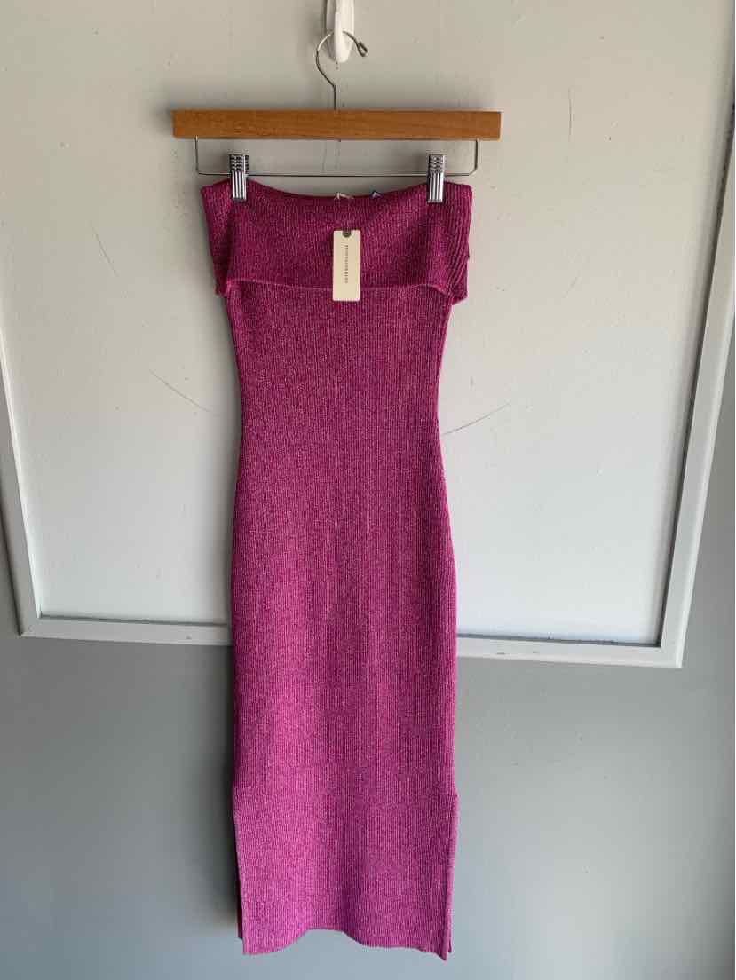 Sleeveless ribbed knit dress in vibrant pink with fold-over collar and fitted silhouette.