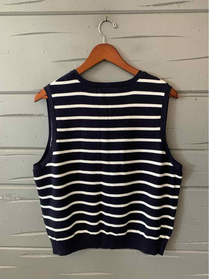 Navy and cream striped sleeveless knit sweater vest with a ribbed hem, hanging on a wooden hanger.