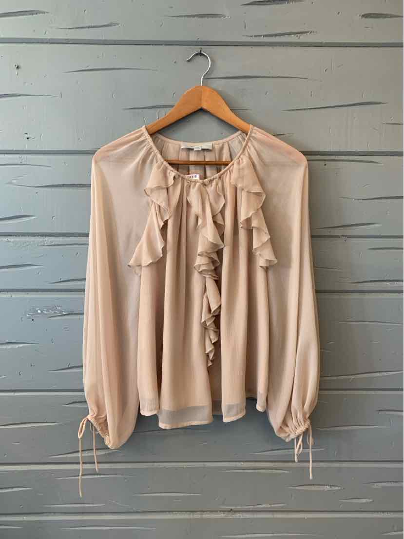 Light beige long-sleeve blouse with front ruffle detail and tie cuffs, size small.